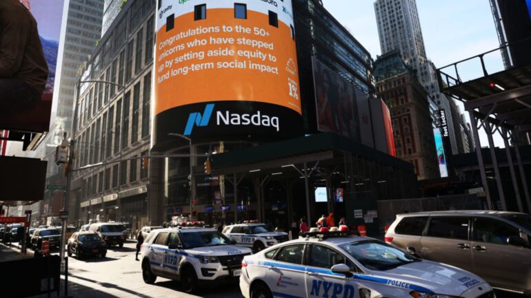 Stocks making the biggest moves premarket: Procter & Gamble, Travelers, Nasdaq and more