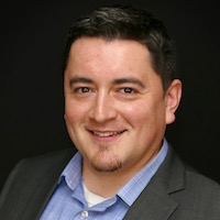 BLOG: Local business executive gets paid through punk rock